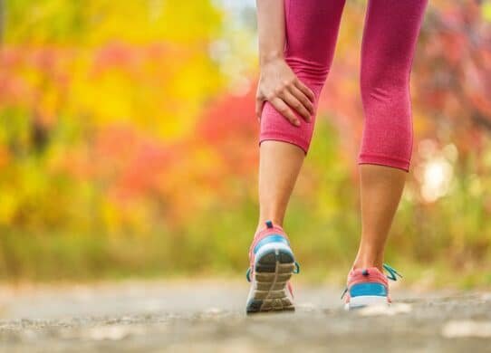 Leg muscle cramp calf sport injury outdoors exercise.